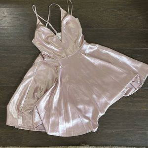 Rose gold mini dress with cross straps on the back